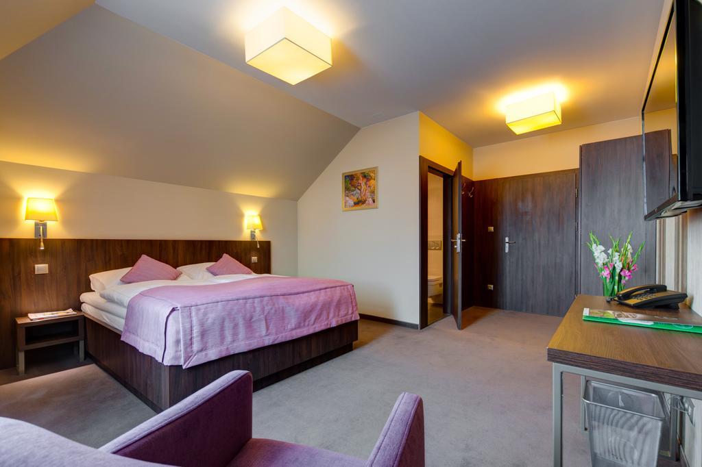 Hotel Figa Plewiska Стая снимка