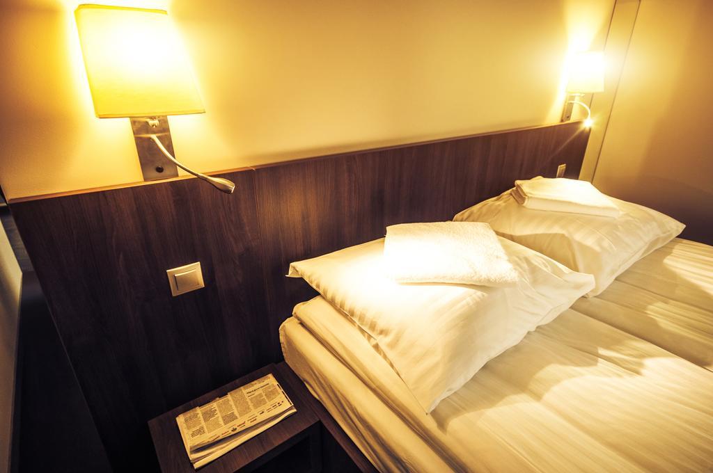 Hotel Figa Plewiska Стая снимка